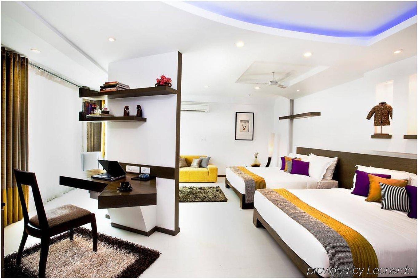 Melange Astris Aparthotel Bangalore Habitación foto